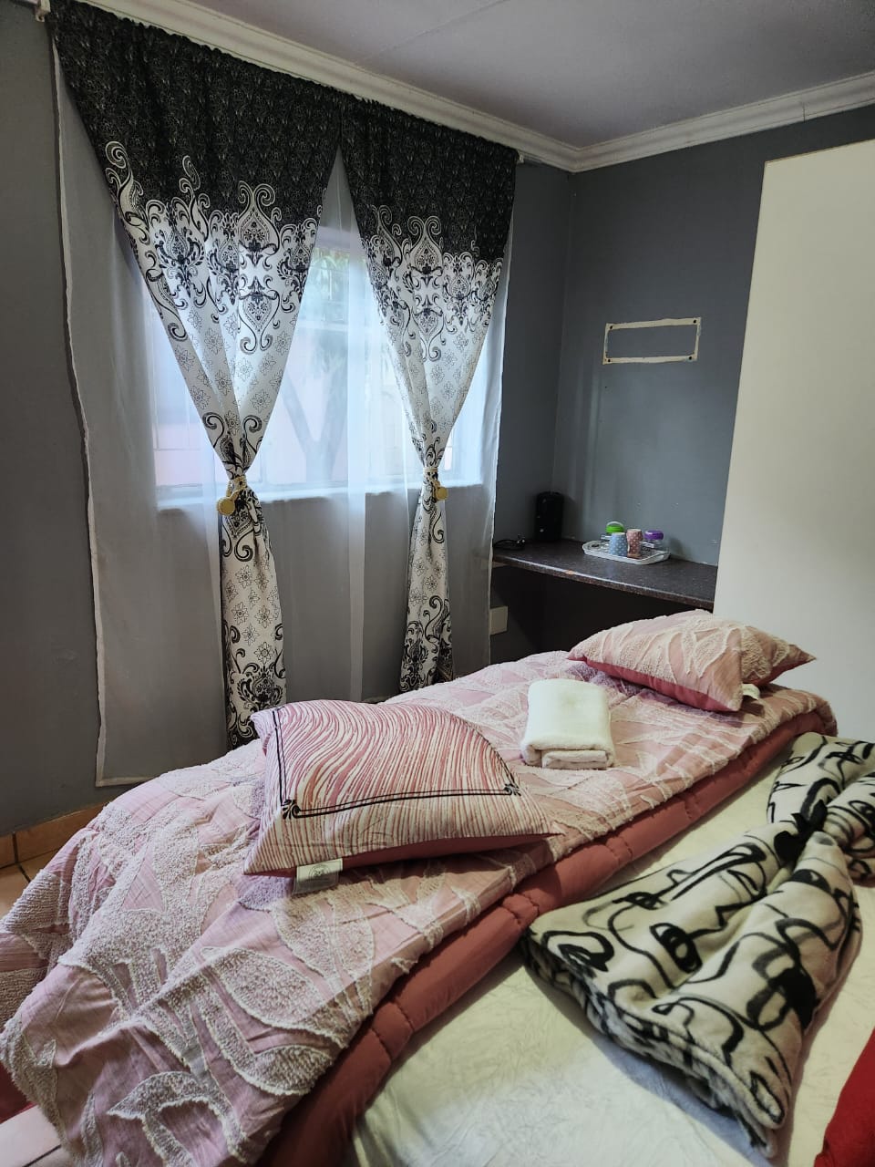 Room with window and wardrobe